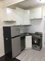 Apartamento Theatre District - Cocina