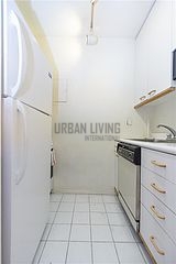 Apartamento Theatre District - Cocina