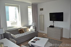 Apartment Theatre District - Living room