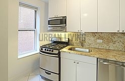 Apartamento Theatre District - Cocina