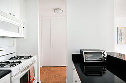 Apartamento Theatre District - Cozinha