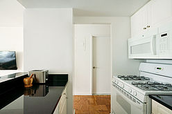 Apartamento Theatre District - Cocina