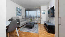 Apartment Theatre District - Living room