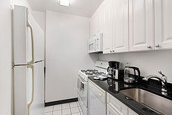 Apartamento Theatre District - Cozinha