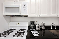 Appartamento Theatre District - Cucina