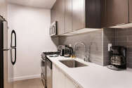 Apartamento Theatre District - Cocina