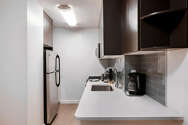 Apartamento Theatre District - Cocina