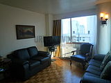 Apartment Theatre District - Living room