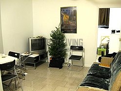 Apartamento Theatre District - Salón